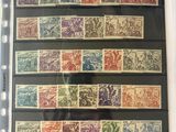 a folder with a lot of different stamps on it