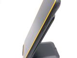an image of a close up of a cell phone on a stand