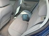 a bag in the back seat of a car