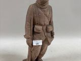 figurine représentant un soldat portant une étiquette nominative sur la poitrine