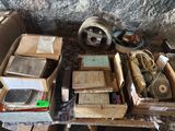 a pile of old books and other items on the floor