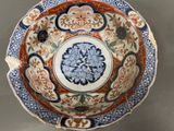 an image of a bowl with a flower design on it