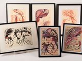 six framed art pieces of different colors and sizes on a white surface