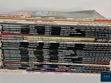 a lot of dvds stacked on top of each other
