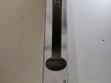 a box that has a black and white clock inside of it