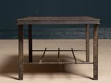 a small wooden table with a magazine rack on it