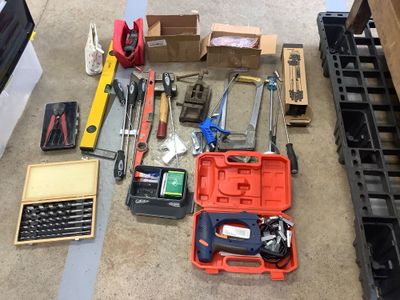a lot of tools that are sitting on the floor