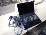 a laptop computer that is sitting on a table