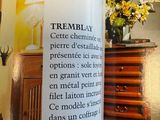 a picture of a candle that is sitting on a table