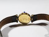 an image of a close up of a watch on a white surface