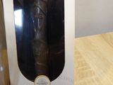 packaging of a chocolate bar in a box on a wooden table