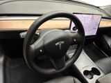 the interior of a car with a steering wheel, dashboard, and dash board