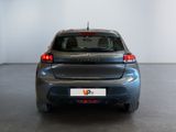 a picture of a grey car parked in a room