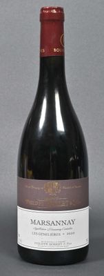 a bottle of wine that is sitting on a table
