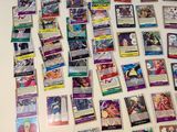 a table with a lot of pokemon cards on it