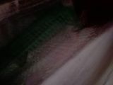 a blurry photo of a bathroom with a sink and toilet