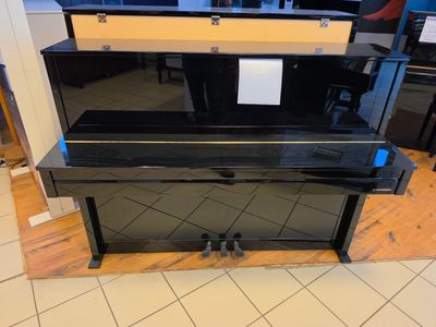 a piano that is sitting in the middle of the floor