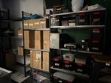 a room with a lot of boxes and boxes on the shelves