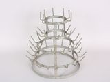a picture of a metal wine rack on a white background