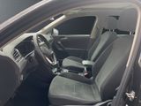 the interior of a car with two seats and a steering wheel