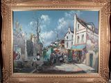 a picture of a painting of a street scene in a frame