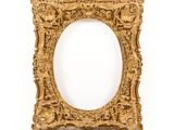 an ornate gold frame with a white background and a white background