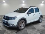a picture of a white dacia parked in a room