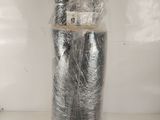 a roll of silver foil wrapped in plastic on a table