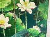 two paintings on the wall of a room with a painting of flowers