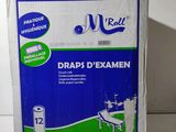 une photo d'une boîte de draps posée sur une table