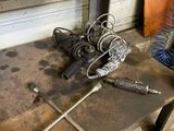 a bunch of tools that are laying on the floor