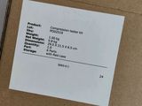an image of a box with a price label on it sitting on a table