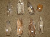 several pieces of rock are arranged in a circle on the floor