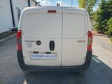 a white van parked on the side of the road