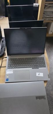 two laptops that are sitting on a table