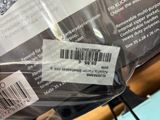 a plastic bag with a barcode on it sitting on top of a table