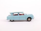 a toy car that is sitting on a white surface