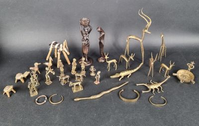 a lot of gold figurines on a table