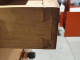 a close up of a piece of wood on a table
