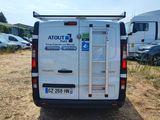 a white van that is parked in a lot