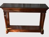 an image of a wooden table with a black top on a white background