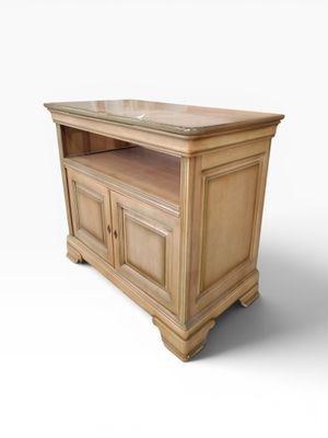 an image of a wooden tv stand with a marble top
