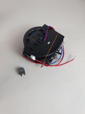 a black clock that is sitting on a white table