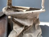 two bags that are sitting next to each other on a table