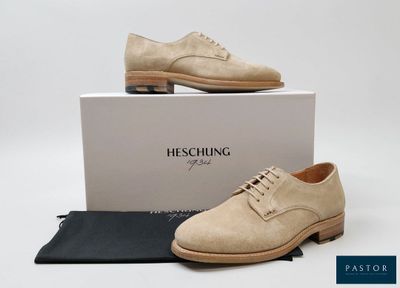 a close up of a pair of shoes on a box