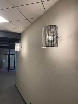 an image of a hallway in a building with a light on