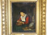 une peinture à l'huile représentant une femme tenant un panier, dans un cadre doré