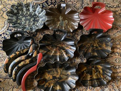 many different types of decorative items on a rug