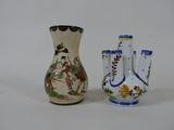 two vases sitting next to each other on a white surface