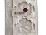 a close up of a package of plastic items on a white surface